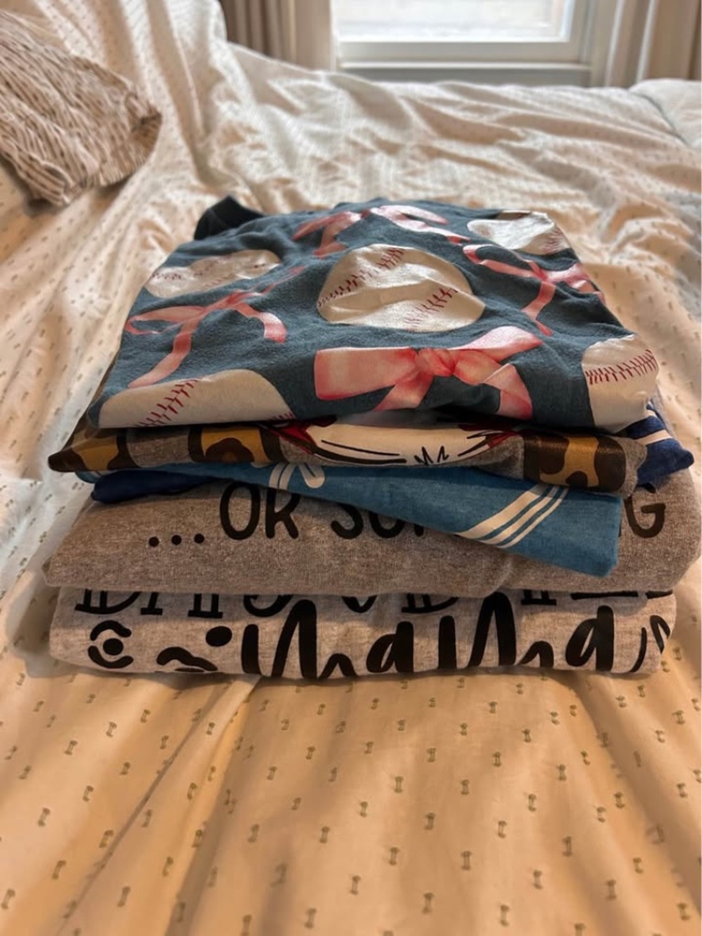 LOT of women's baseball tees, tanks and sweatshirts